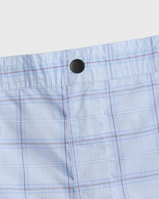 Light blue camp short with red and white grid pattern, black button waistband, and vertical seam details.