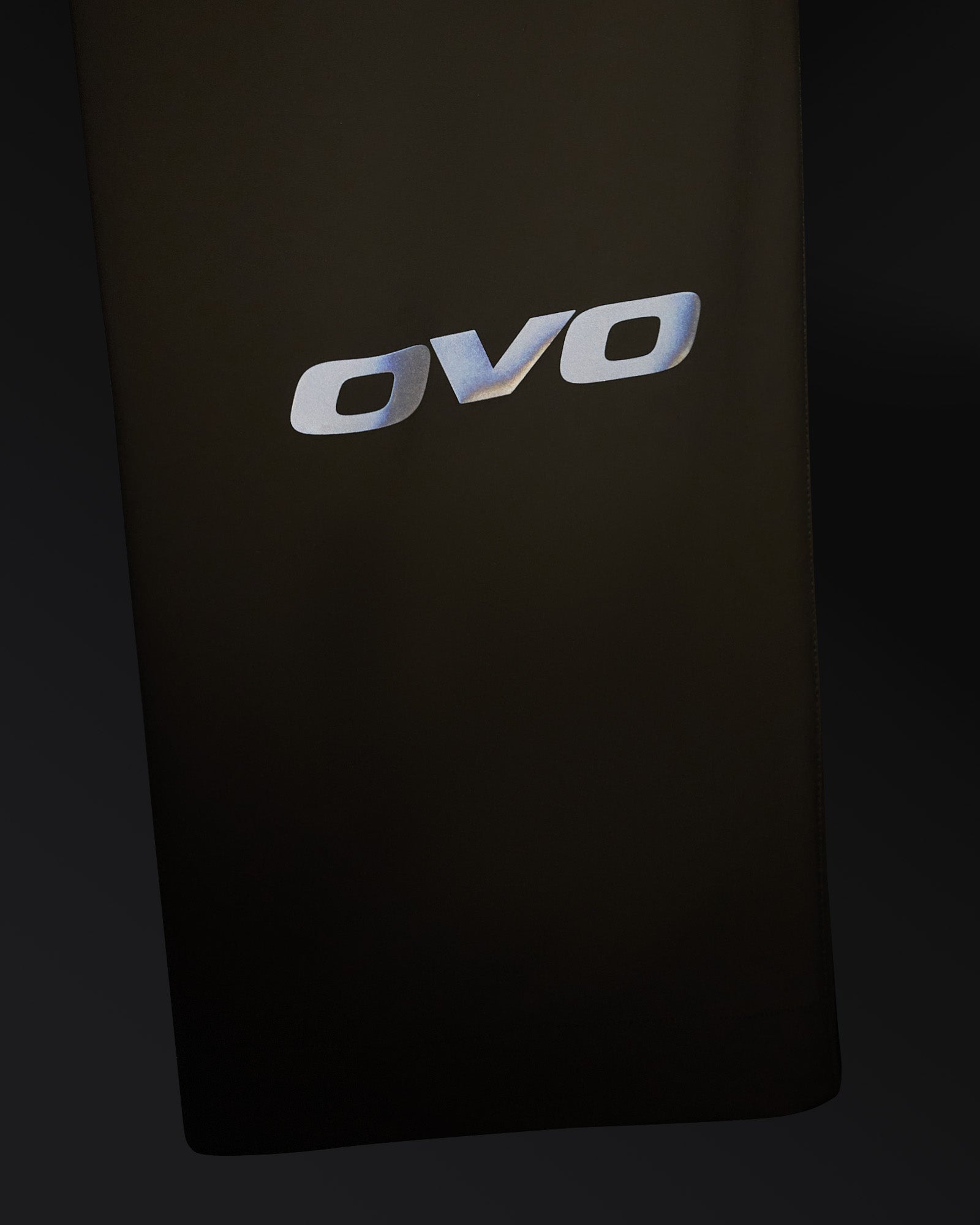 Sandstone-colored stretch nylon chino with OVO logo embroidered on thigh.