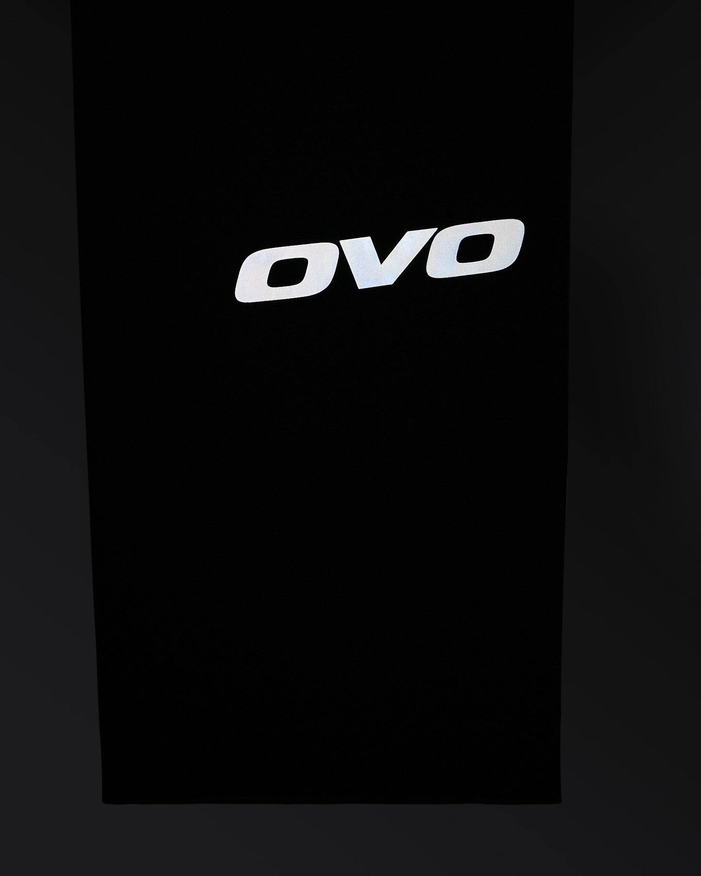 Midnight green stretch nylon chino with white OVO logo printed on front.