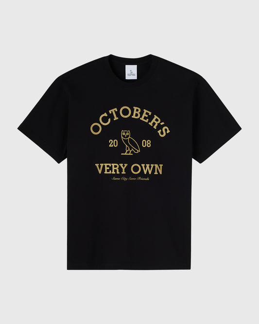Black t-shirt with gold "Octobers 2008 Very Own" text and owl graphic on chest.