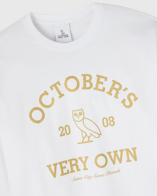 White long-sleeve tee with gold "October's Very Own" text and owl graphic with "2008" dates.