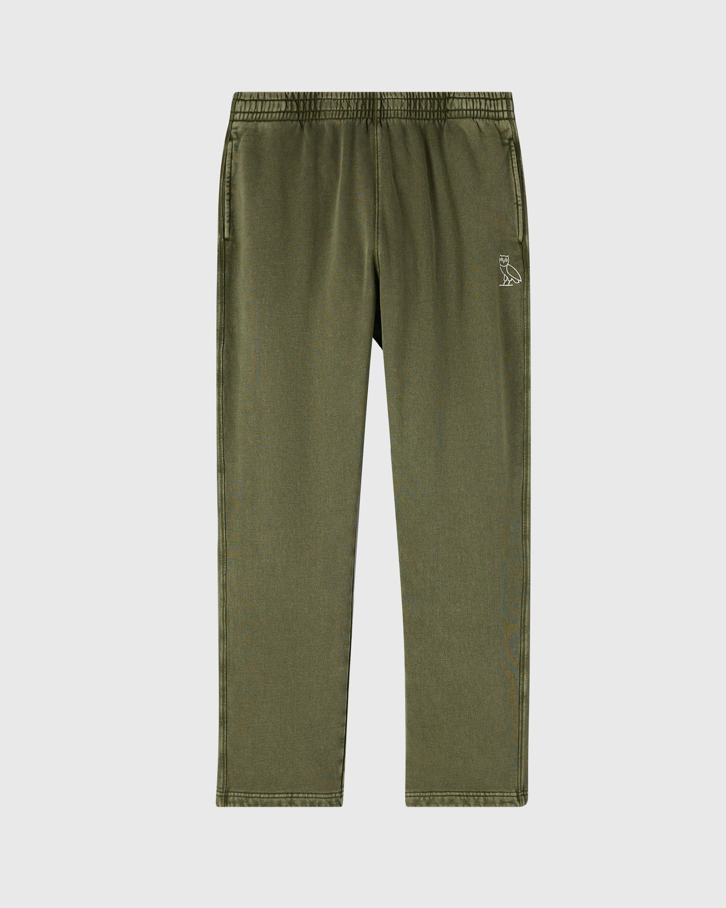 Cypress green sweatpant with elastic waistband, open hem, side pockets, and small owl emblem on thigh.
