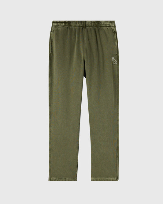 Cypress green sweatpant with elastic waistband, open hem, side pockets, and small owl emblem on thigh.