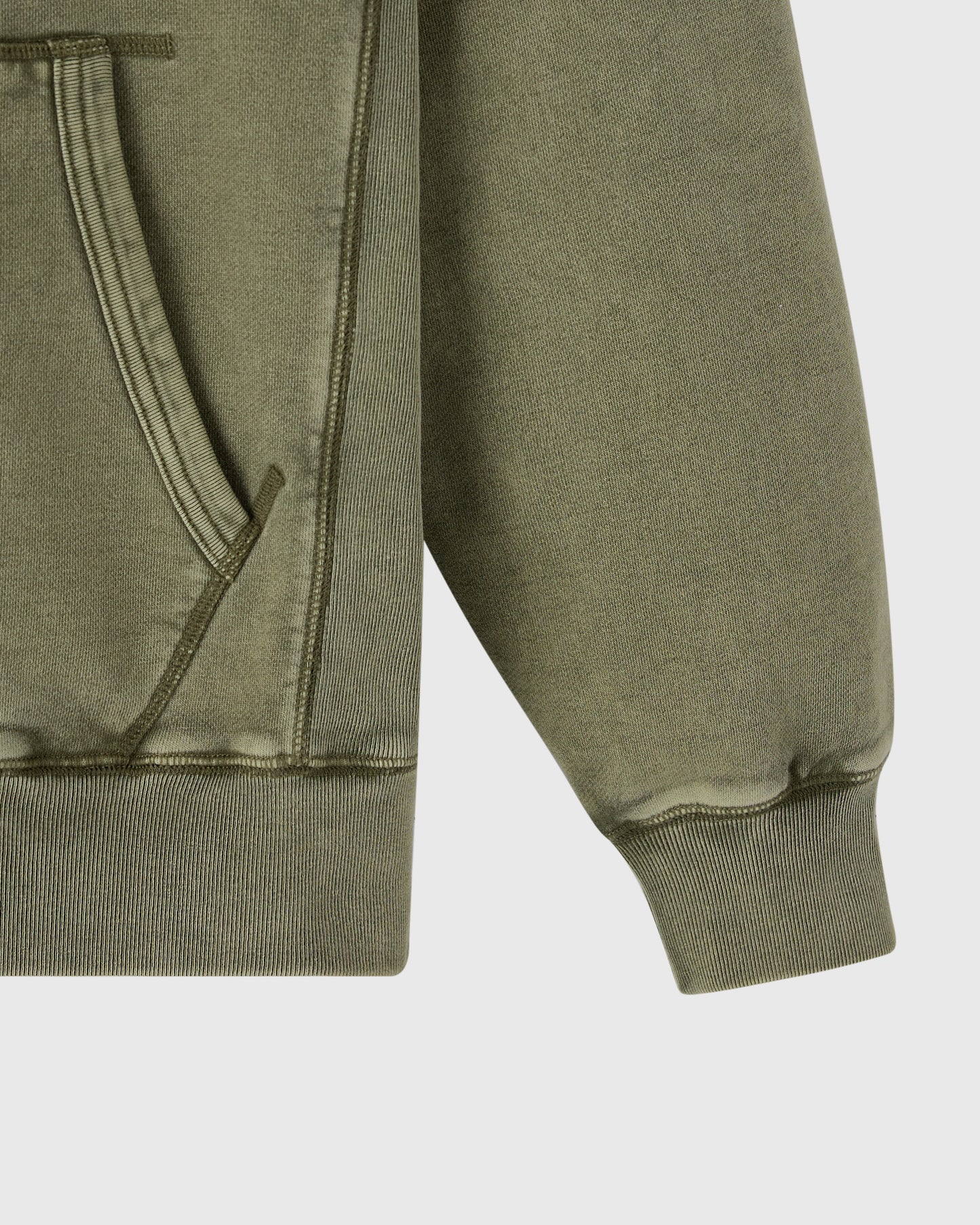 Cypress green raglan hoodie with ribbed cuffs and kangaroo pocket detail visible on torso and sleeves.