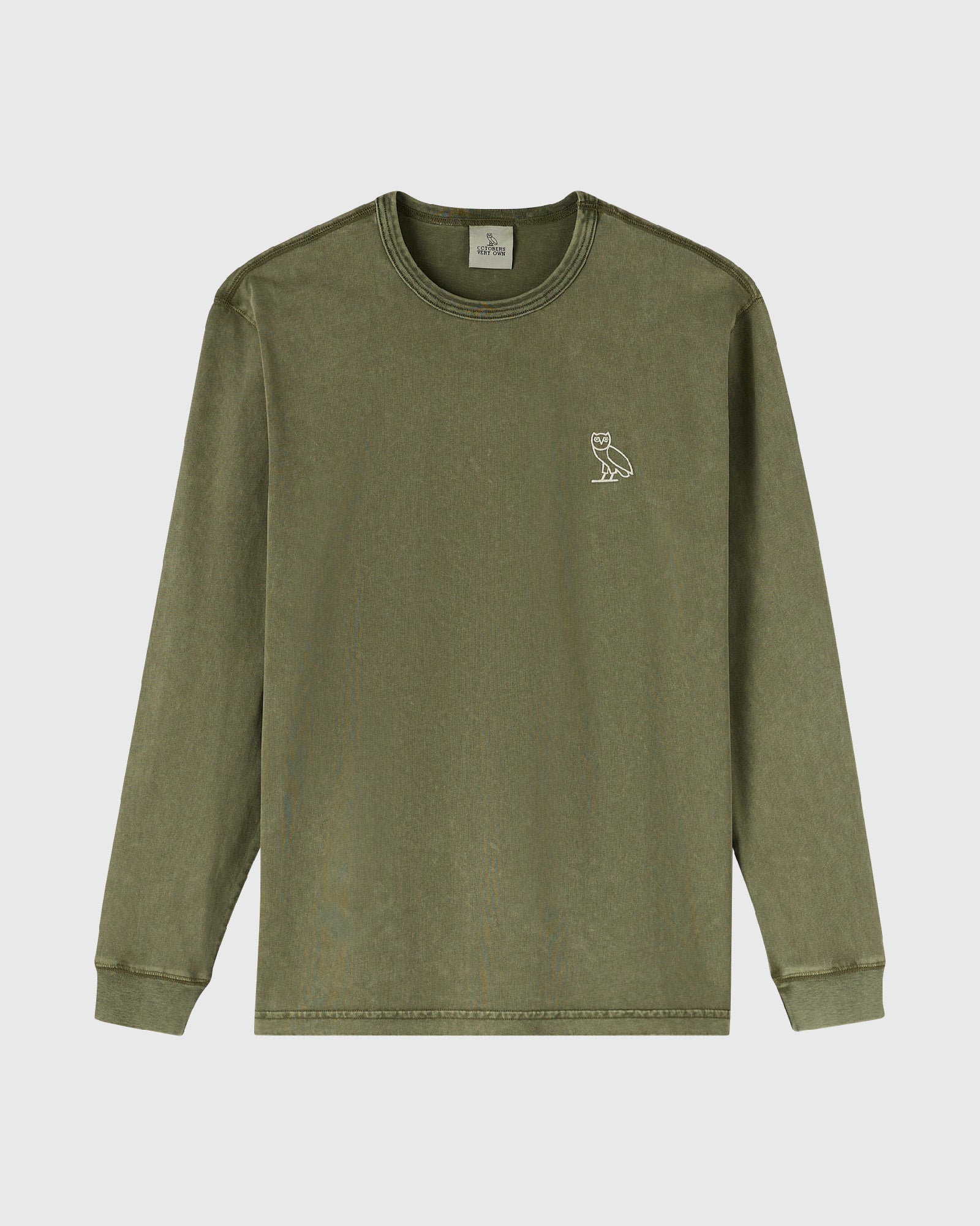 Cypress-colored long-sleeve tee with small owl emblem on chest.