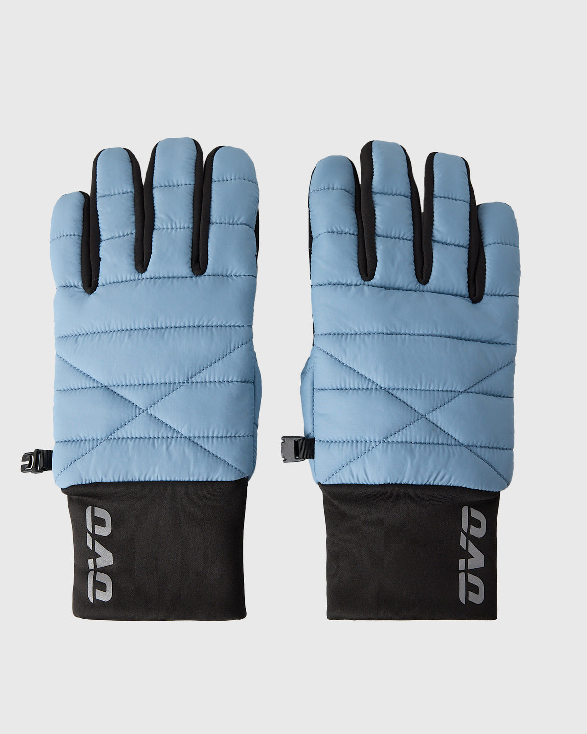 Pair of light blue quilted gloves with black trim, black cuffs, and adjustable wrist straps.