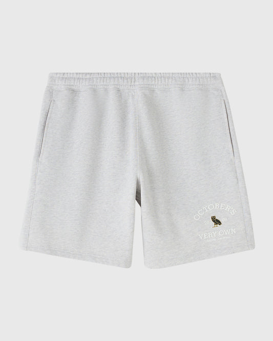 Ash heather grey shorts with elastic waistband and embroidered owl graphic on right leg.
