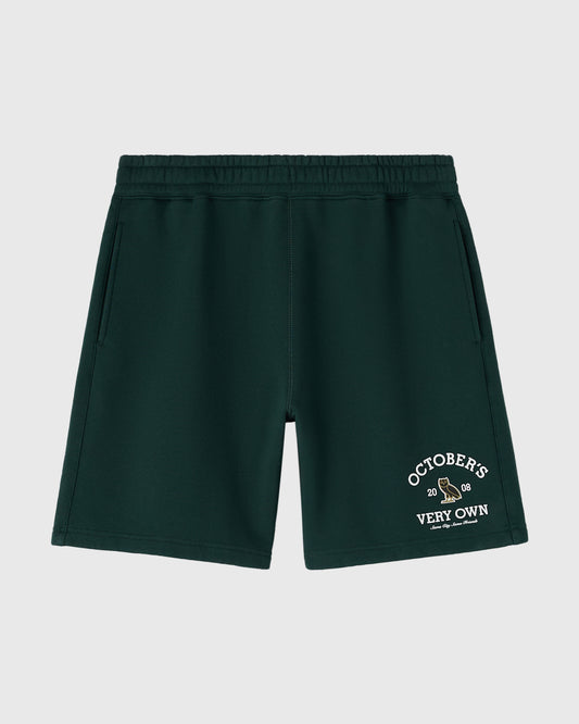 Midnight green shorts with elastic waistband and white "Octobers Very Own" graphic print on right leg.