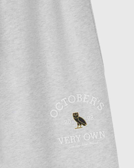 Ash heather grey sweatpant with "Octobers Very Own" text and owl emblem printed on leg.