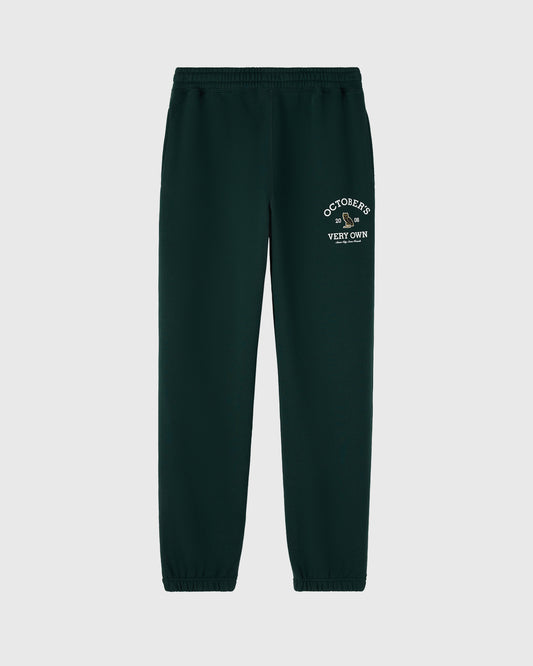 Midnight green sweatpant with white "Octobers Very Own" text graphic on thigh and elastic waistband and cuffs.