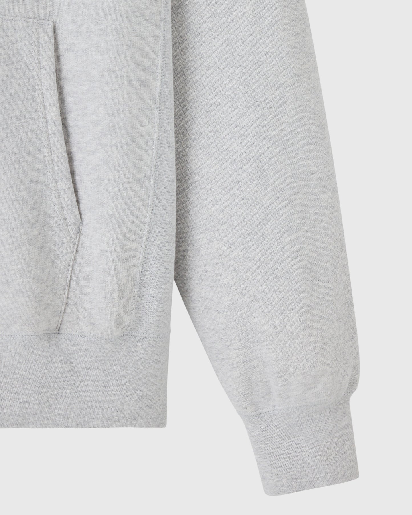 Ash heather grey hoodie with ribbed cuffs and kangaroo pocket detail visible on front.