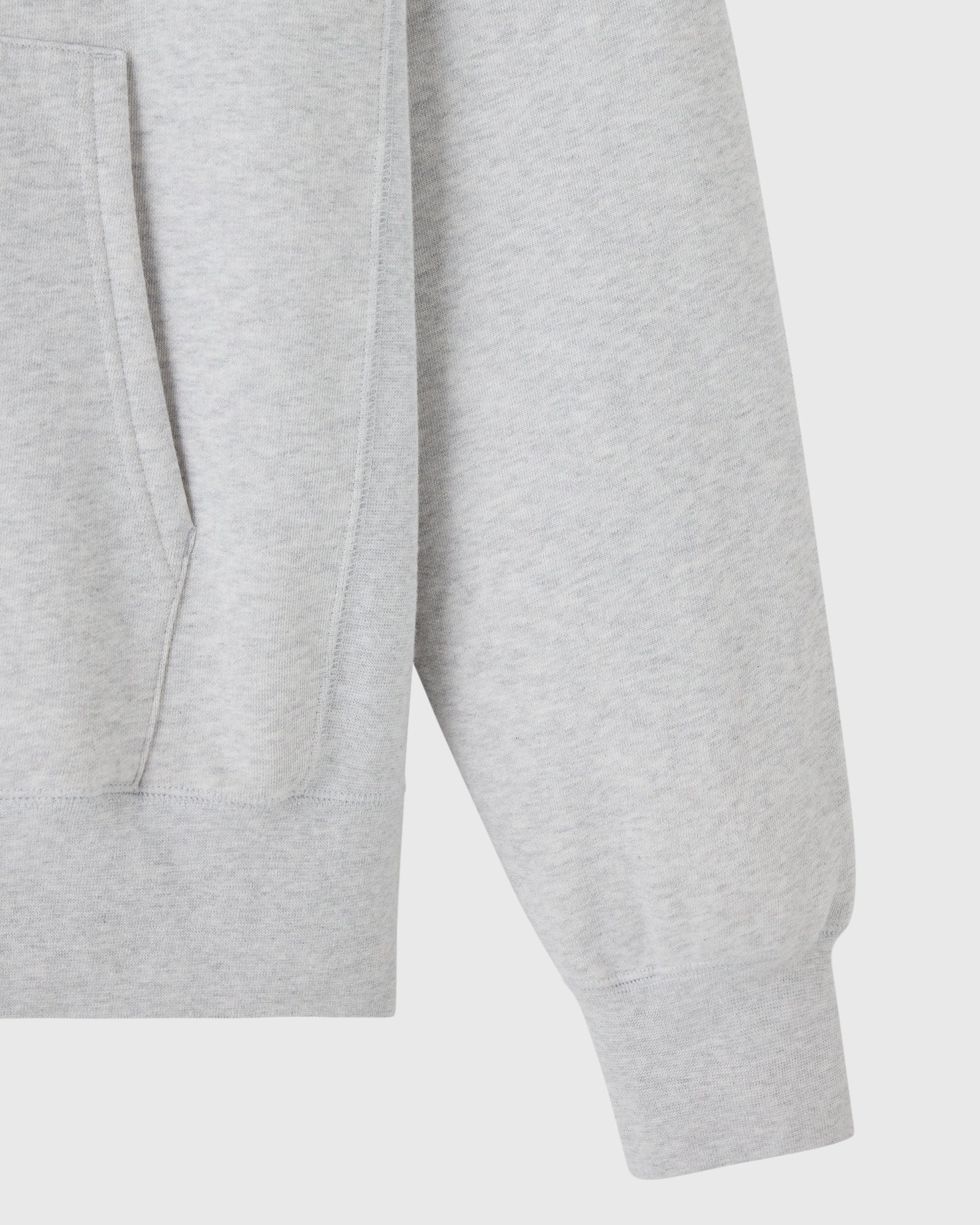 Ash heather grey hoodie with ribbed cuffs and kangaroo pocket detail visible on front.