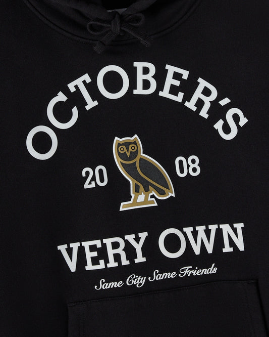Black hoodie with white text reading "Octobers Very Own," owl graphic, and "Same City Same Friends" slogan on chest.