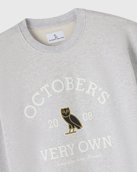 Ash heather grey crewneck sweatshirt with "Octobers Very Own" text and owl graphic on chest.