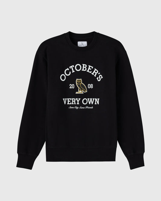 Black crewneck sweatshirt with white "Octobers Very Own" text and gold owl graphic with "2008" below.