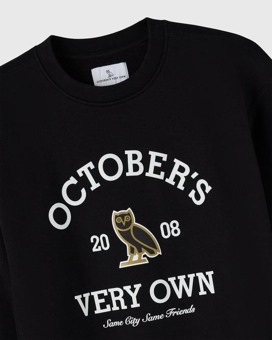 Black crewneck sweatshirt with white text reading "October's Very Own 2008" and gold owl graphic.