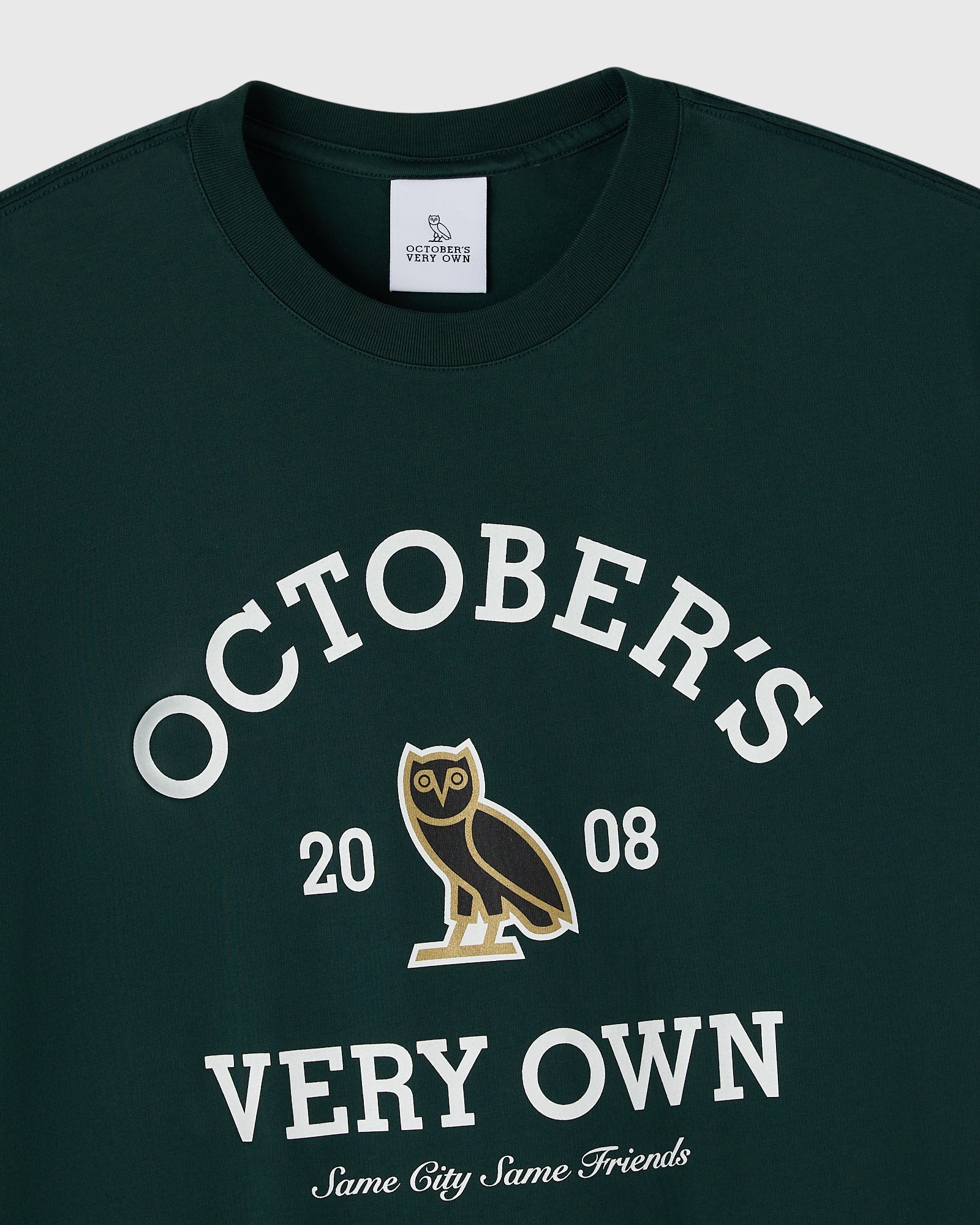 Midnight green crewneck tee with white "Octobers Very Own" text, owl graphic, and "2008" numerals.
