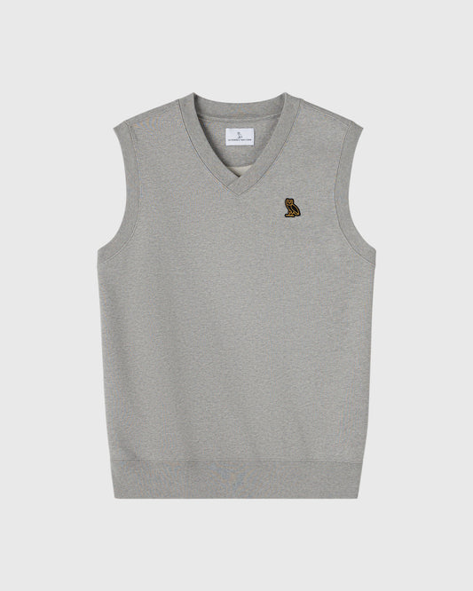 Heather grey sleeveless vest with V-neckline and small embroidered owl logo on chest.