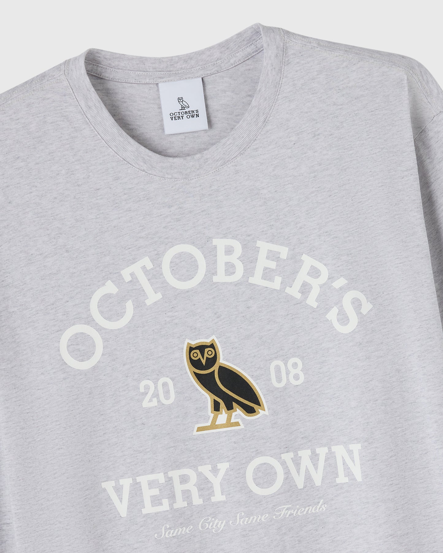 Ash heather grey long-sleeve tee with "October's Very Own" text, owl graphic, and "2008" printed on chest.
