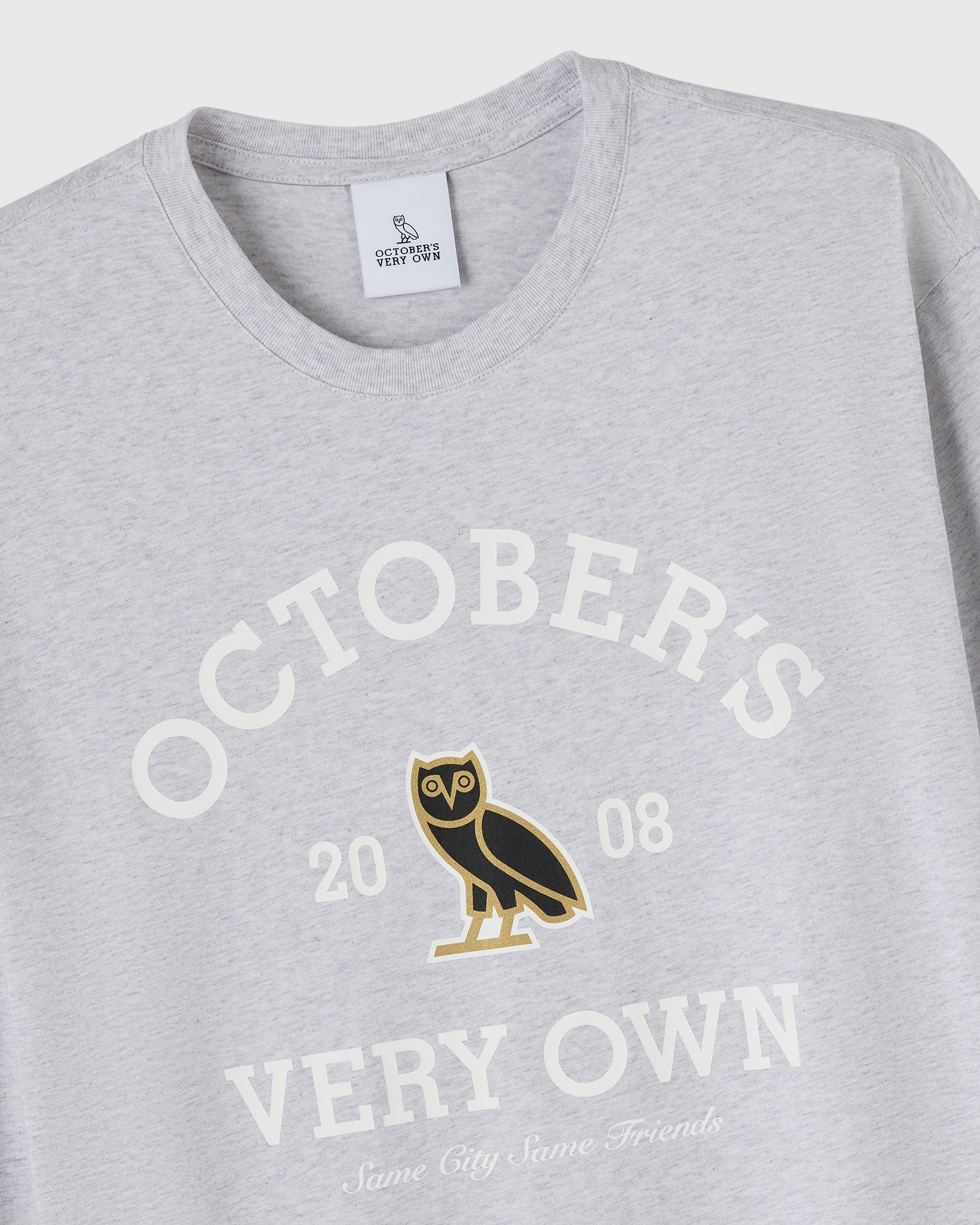 Ash heather grey long-sleeve tee with "October's Very Own" text, owl graphic, and "2008" printed on chest.