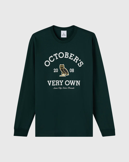Midnight green long-sleeve tee with "October's Very Own" text and owl graphic on chest.