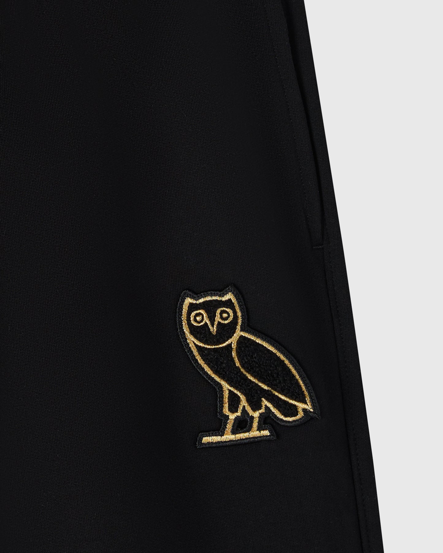 Pantalon de survêtement Signature à ourlet ouvert - Noir