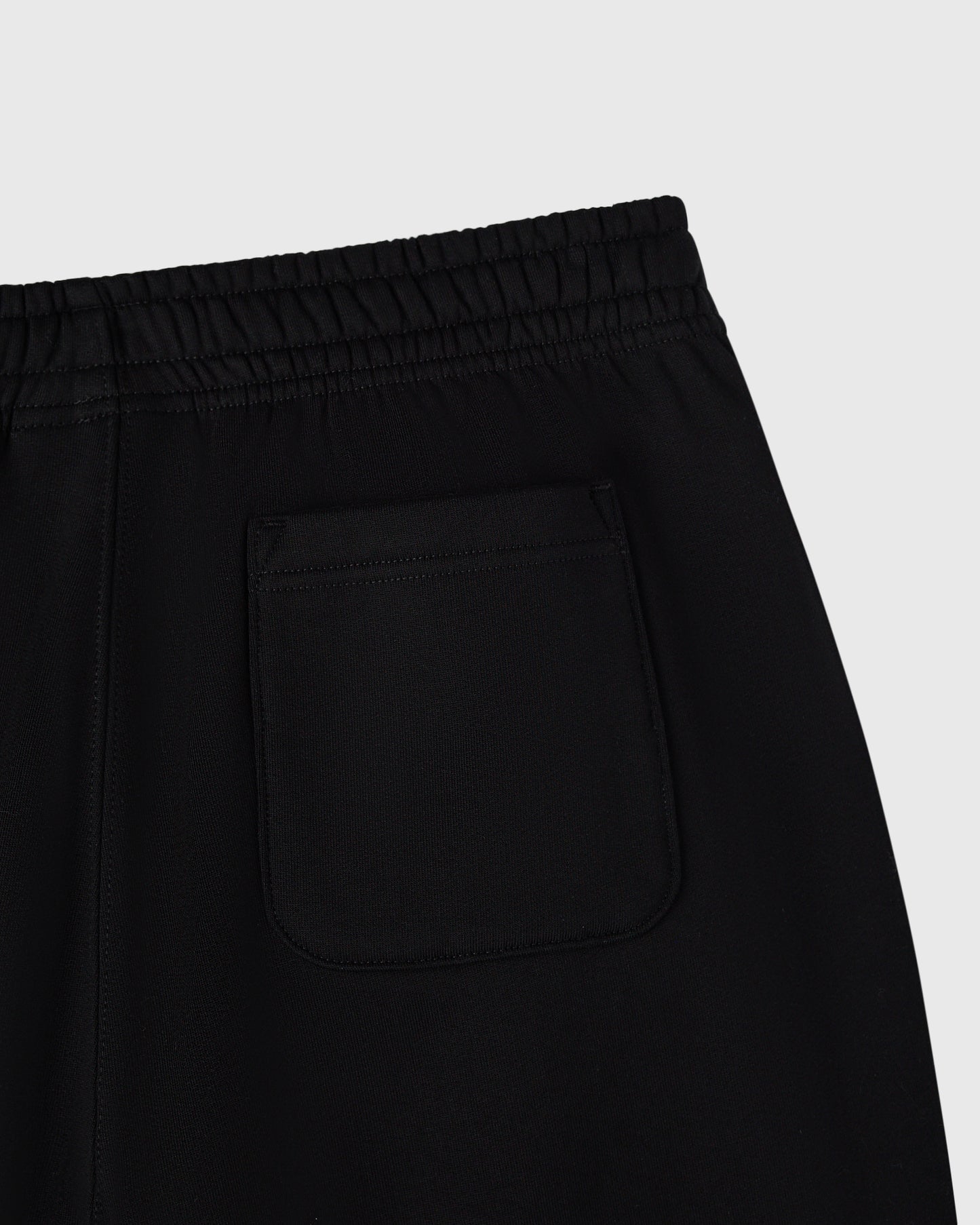 Pantalon de survêtement Signature à ourlet ouvert - Noir
