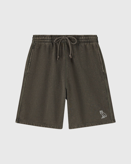 Deep olive sweatshorts with drawstring waist, side seam details, and small embroidered logo on leg.