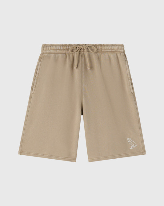 Sandstone sweatshorts with drawstring waist, side pockets, and small owl emblem on right leg.