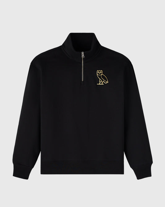 Black quarter-zip mockneck sweatshirt with gold owl embroidery on chest.