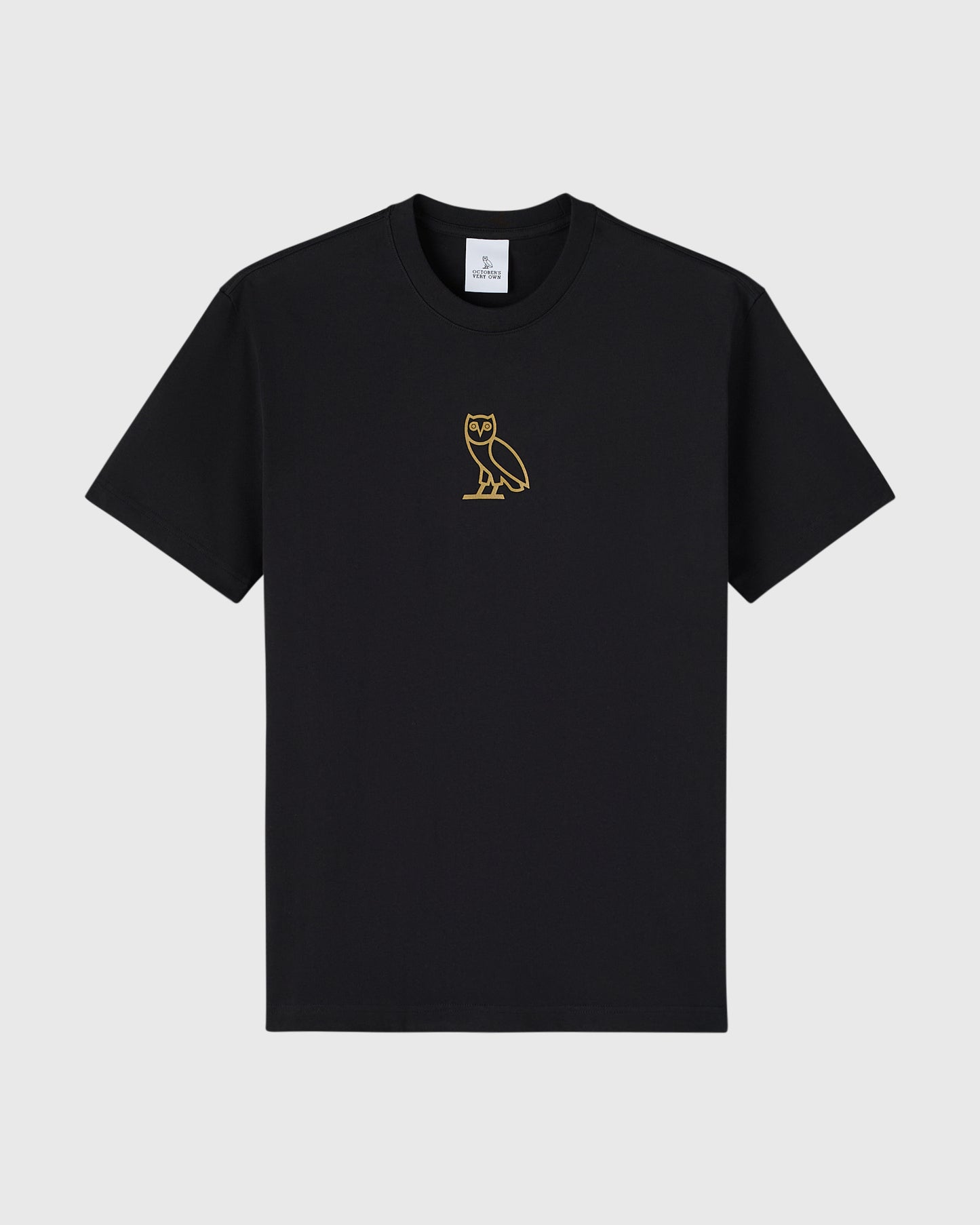 Black crew neck t-shirt with small gold owl embroidered on chest.