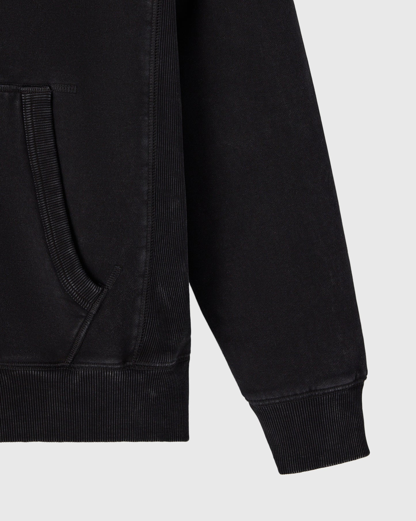 Black raglan full-zip hoodie with ribbed cuffs and hem, showing front pocket and zipper detail.