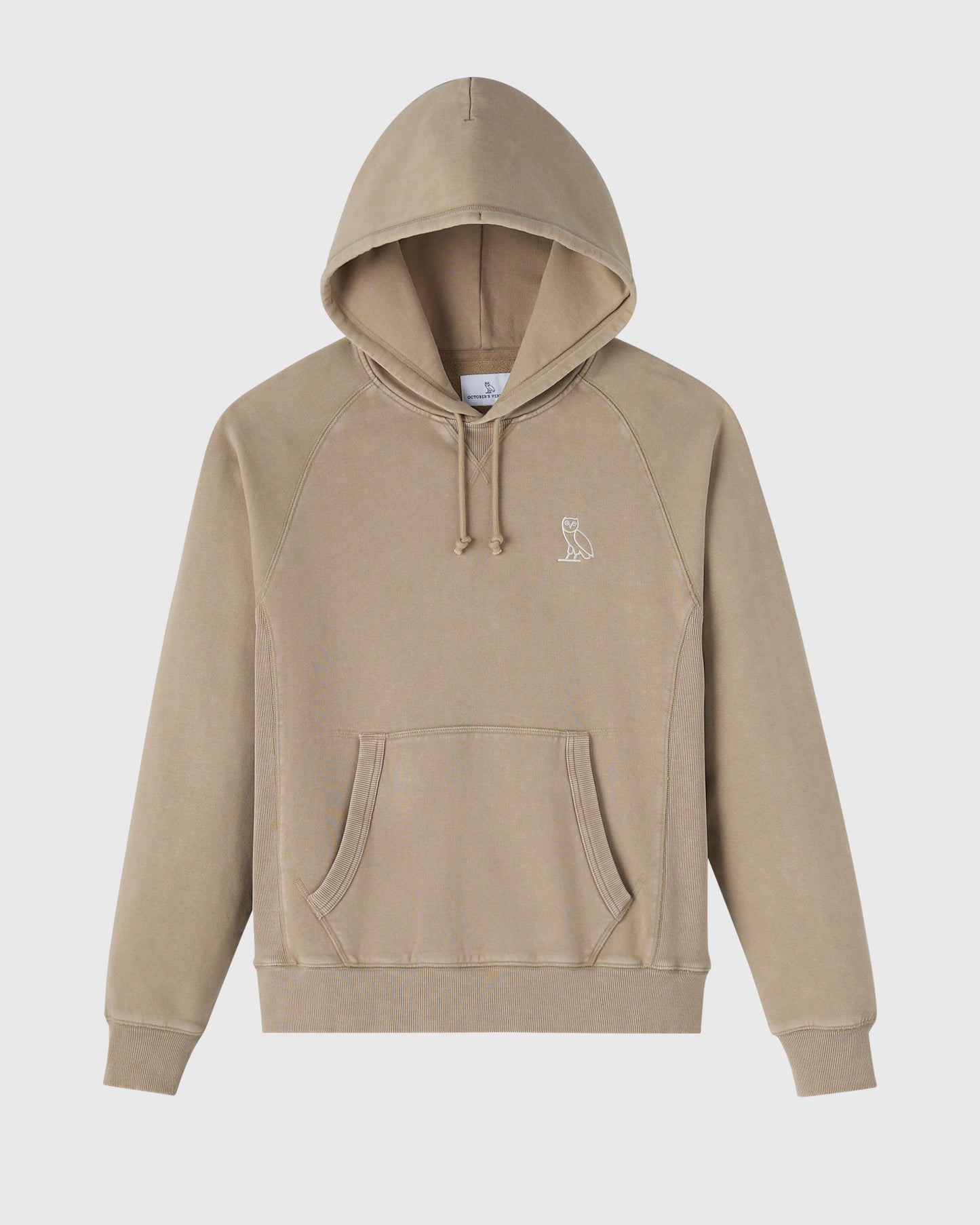 Sandstone raglan hoodie with drawstring hood, kangaroo pocket, and small owl embroidered logo on chest.