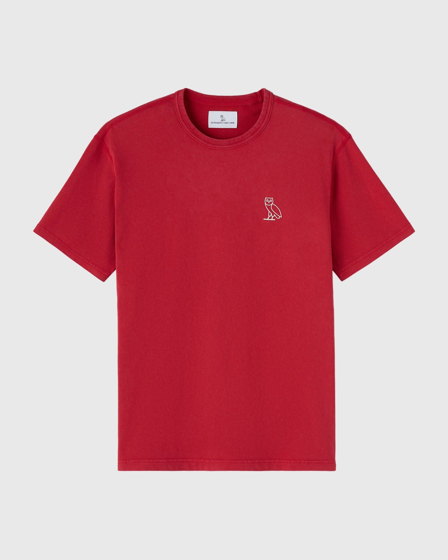 Red crew neck t-shirt with small white owl logo on chest.