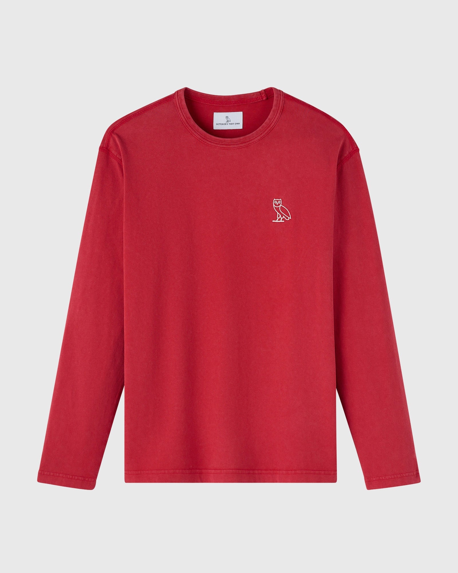 Red long-sleeve t-shirt with small owl embroidered on chest and crew neckline.