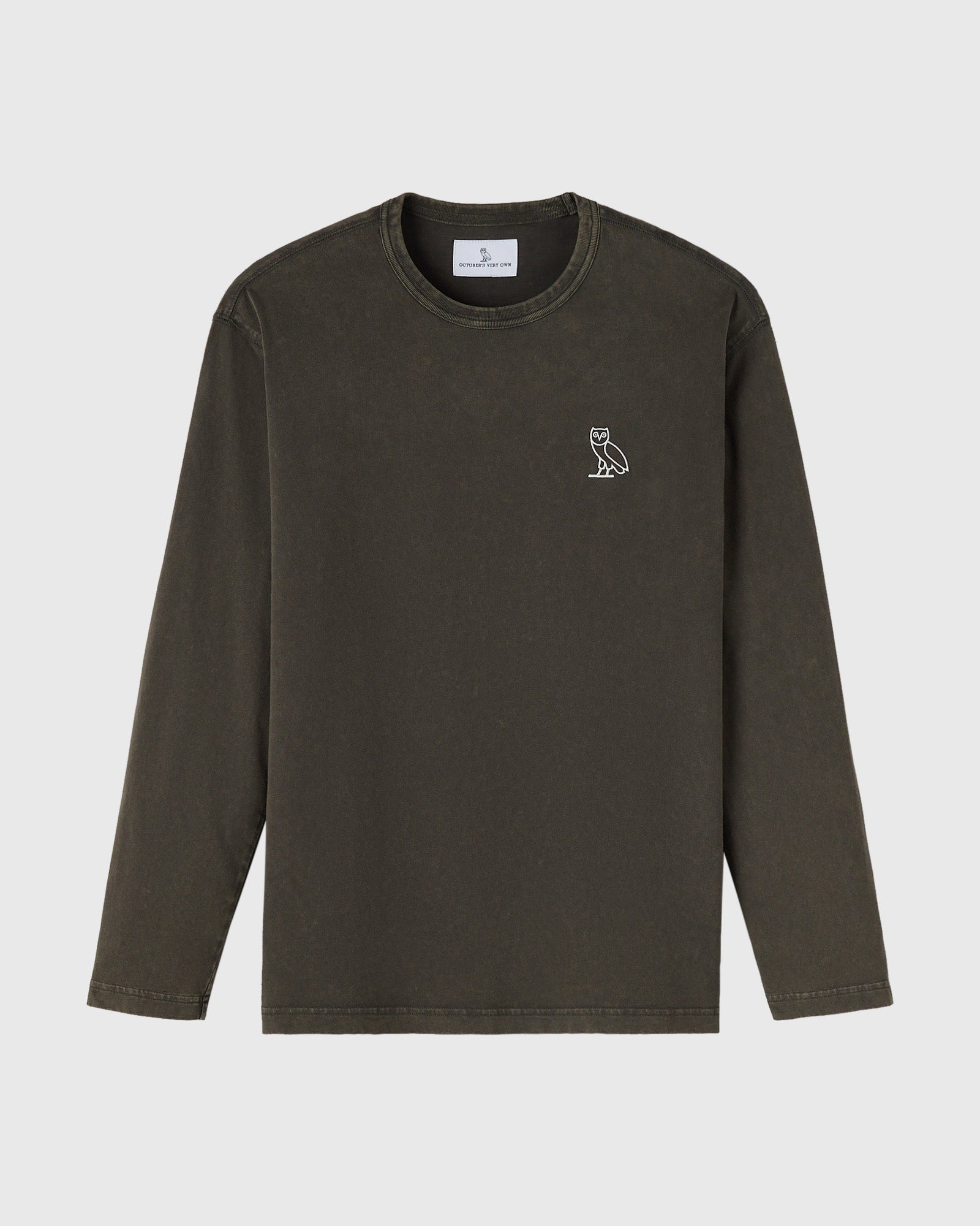 Deep olive long-sleeve tee with crew neckline and small owl embroidery on chest.