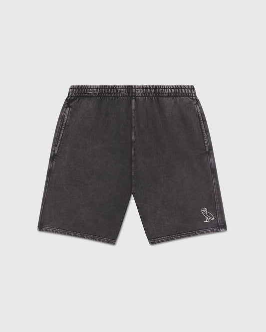 Black garment-dyed shorts with elasticized waistband and small owl logo on right leg.