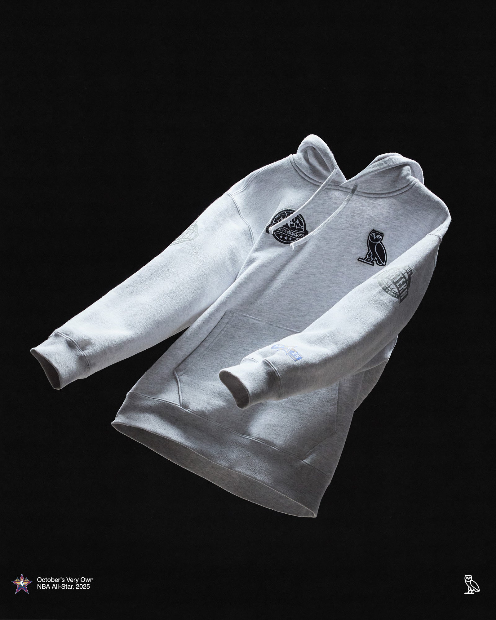 White October's Very Own hoodie with brand logos on a black background
