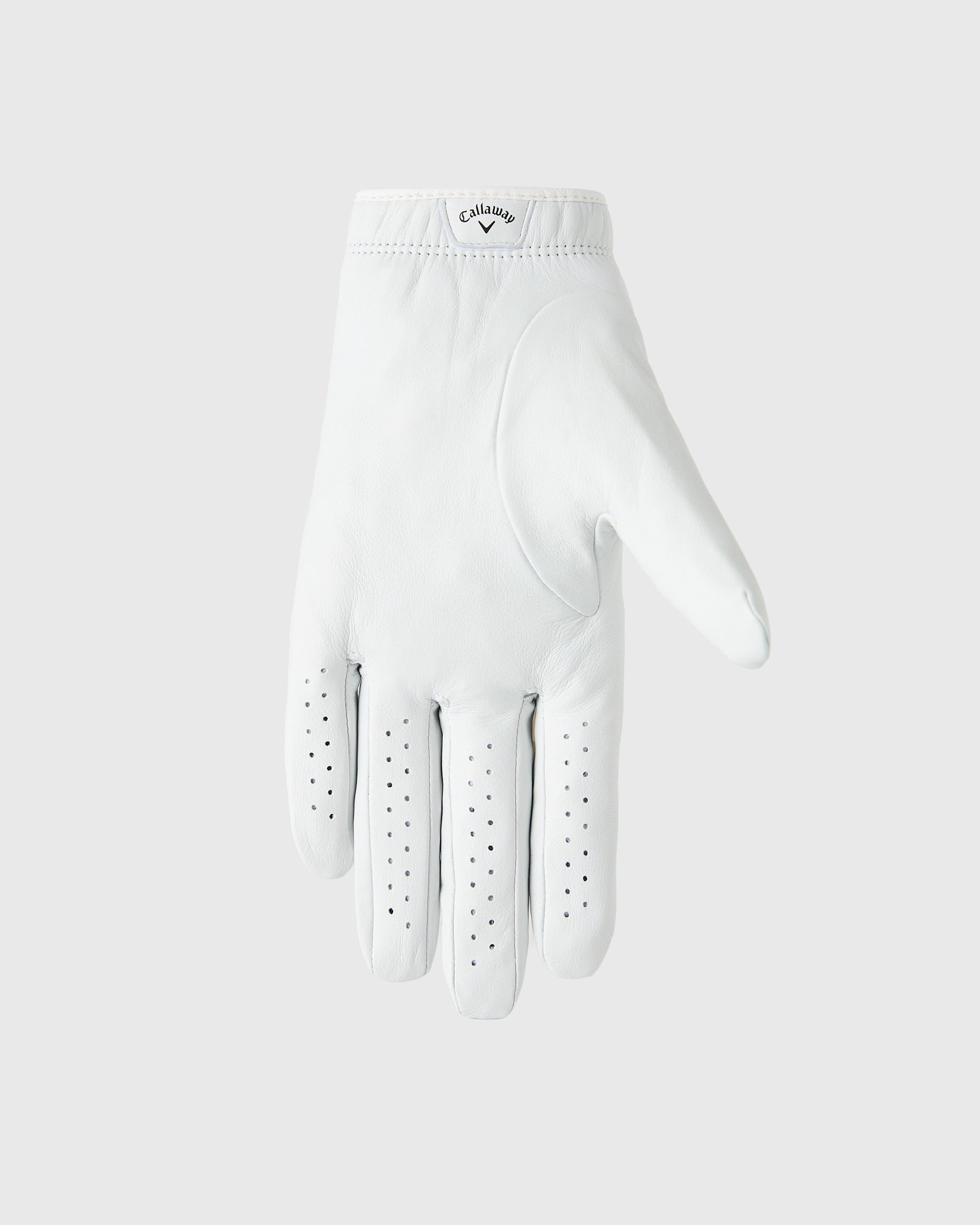 White leather golf glove with perforated finger panels and Callaway branding on cuff.