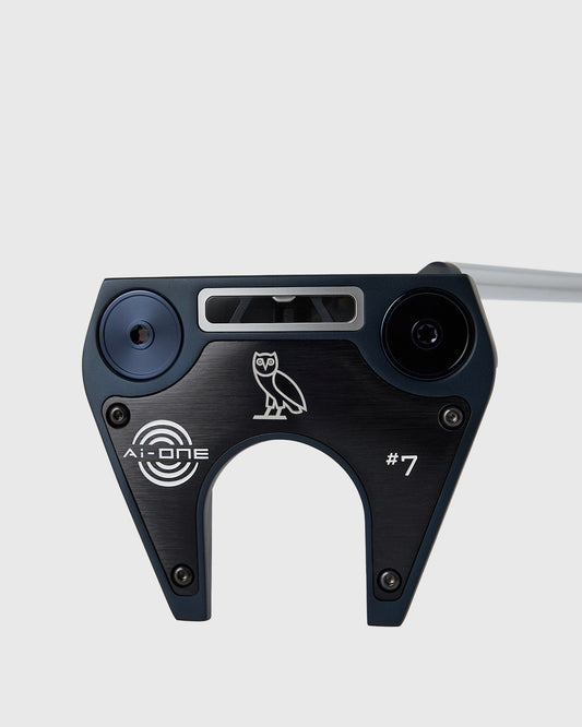 Black Callaway Odyssey Ai-ONE putter head with owl logo, alignment window, and gray shaft visible from above.