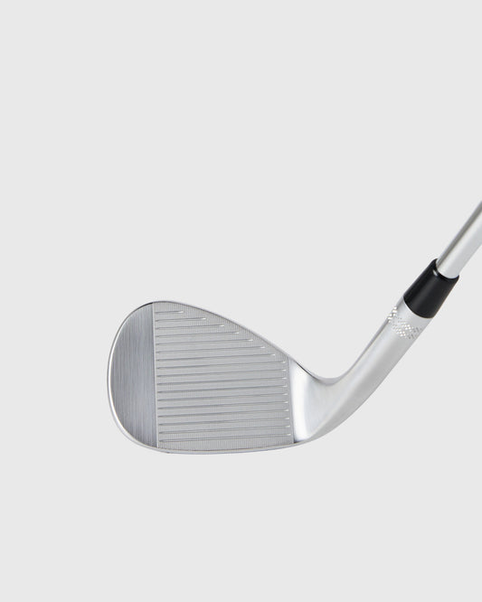 Callaway Opus SP 60 chrome wedge with grooved club face and silver shaft with black grip.