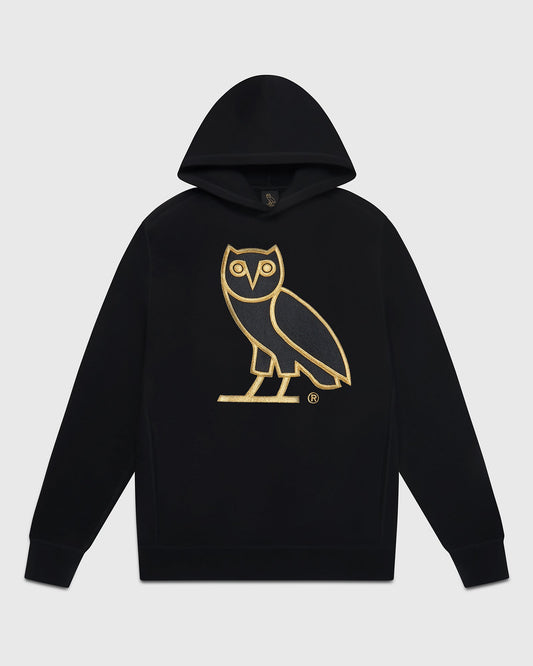 Black hoodie with gold owl graphic and registered trademark symbol on chest.
